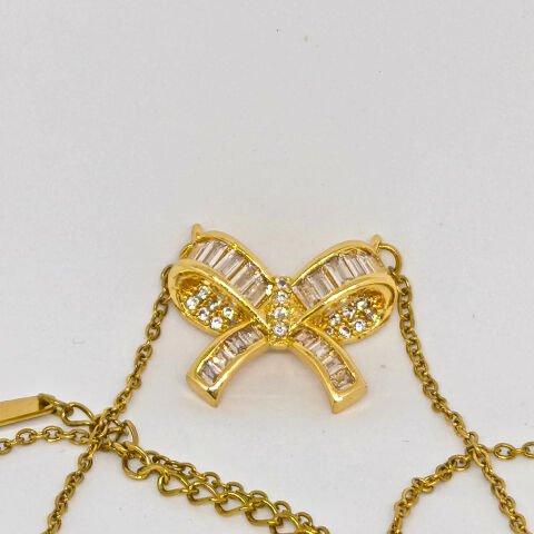 ELEGANT PASLANMAZ ÇELİK  BAGET TAŞLI  FİYONK TASARIMLI GOLD  KOLYE