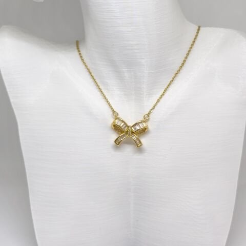 ELEGANT PASLANMAZ ÇELİK  BAGET TAŞLI  FİYONK TASARIMLI GOLD  KOLYE